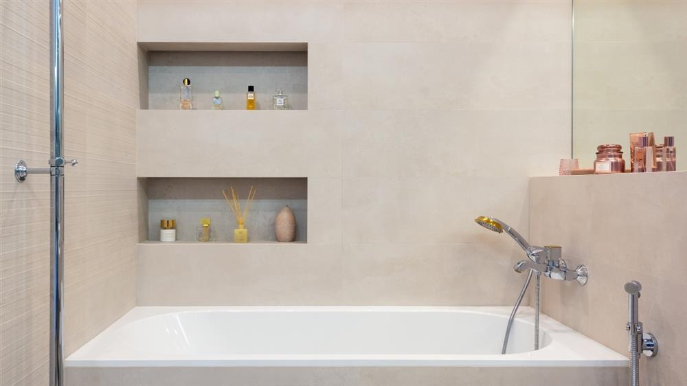  Highlight shower nooks and shelves.